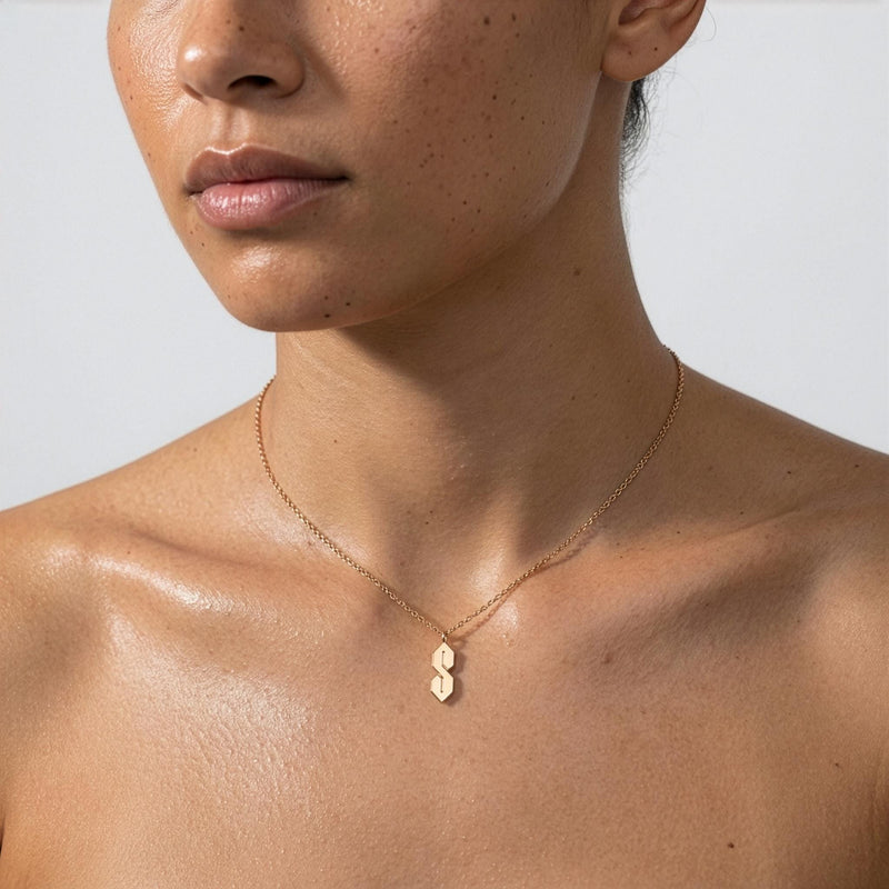 Fine gold chain necklace with an angular geometric S shaped pendant (3 of 10)