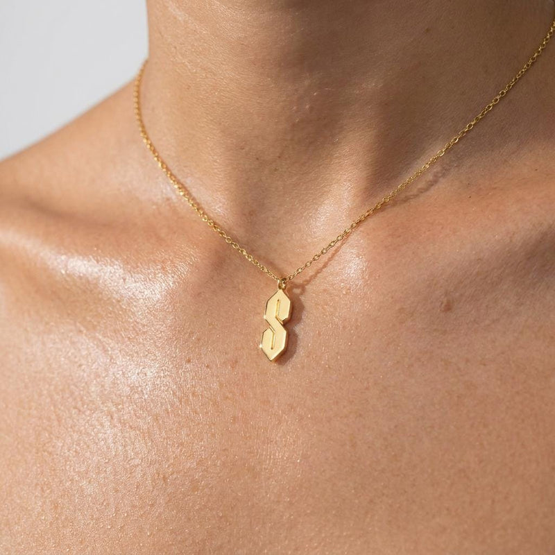 Fine gold chain necklace with an angular geometric S shaped pendant (5 of 10)