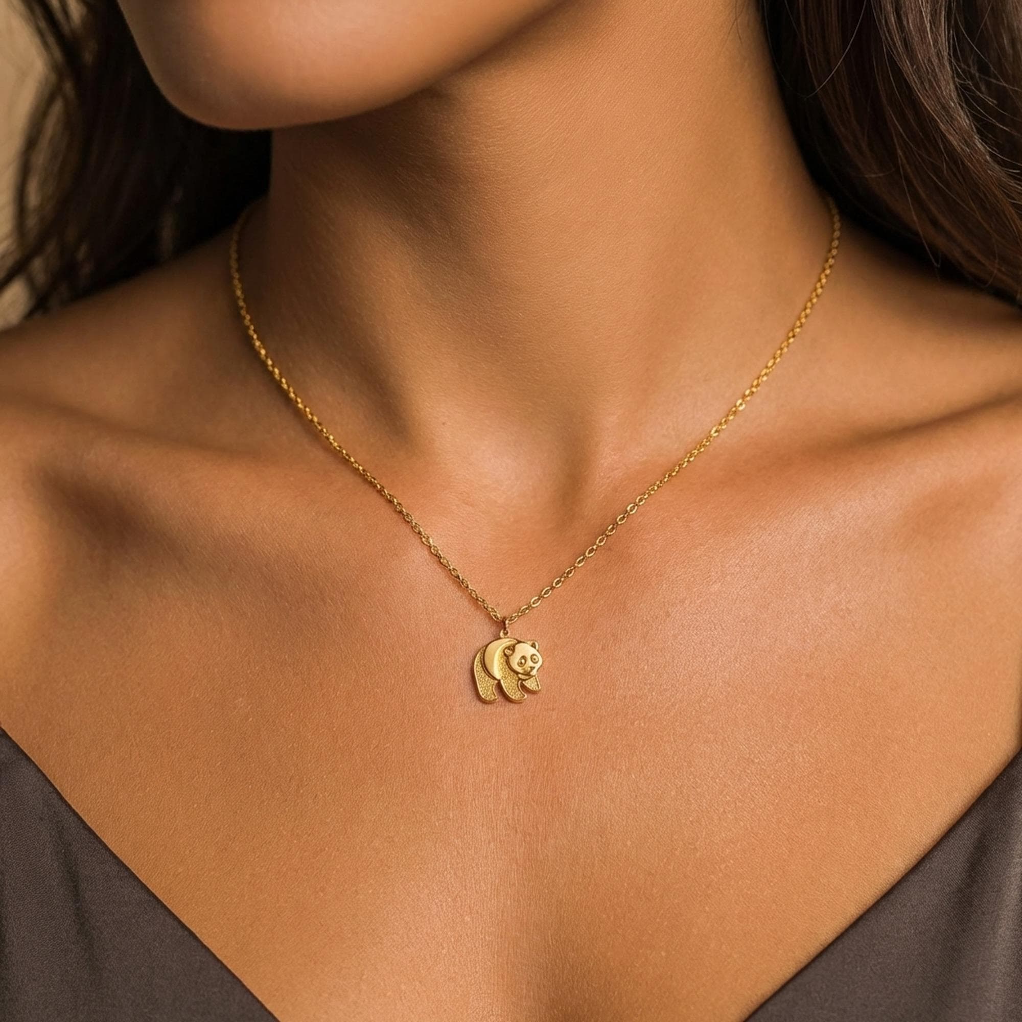 Small round panda face pendant in gold on a thin cable chain, shown against a plain background (2 of 10)
