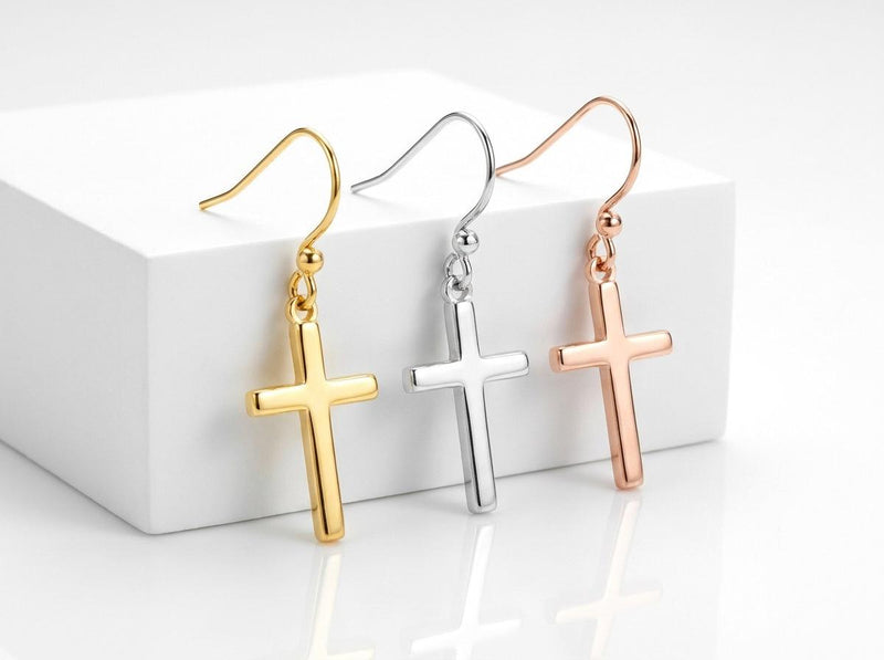 Pair of simple upright cross stud earrings in polished gold