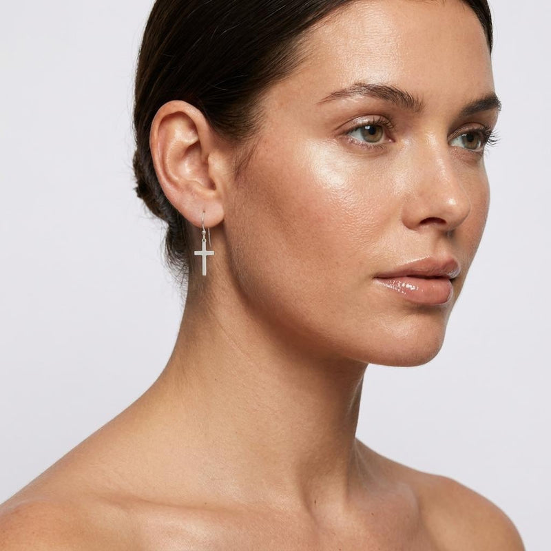 Pair of simple upright cross stud earrings in polished gold (7 of 10)