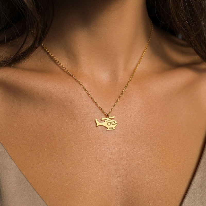 Small helicopter pendant in profile on a fine gold cable chain (3 of 7)