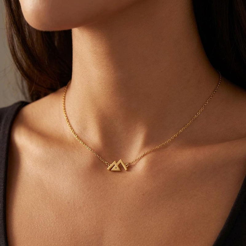 Angular three peak mountain pendant on a fine gold cable chain (2 of 7)