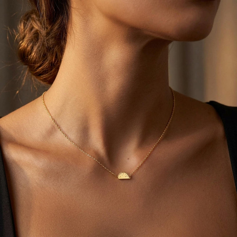 Tiny gold taco pendant on a fine cable chain, shown flat (2 of 5)