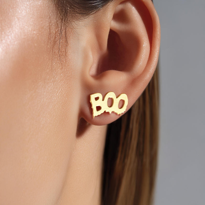 Pair of stud earrings spelling boo in rounded letters, in gold (2 of 8)