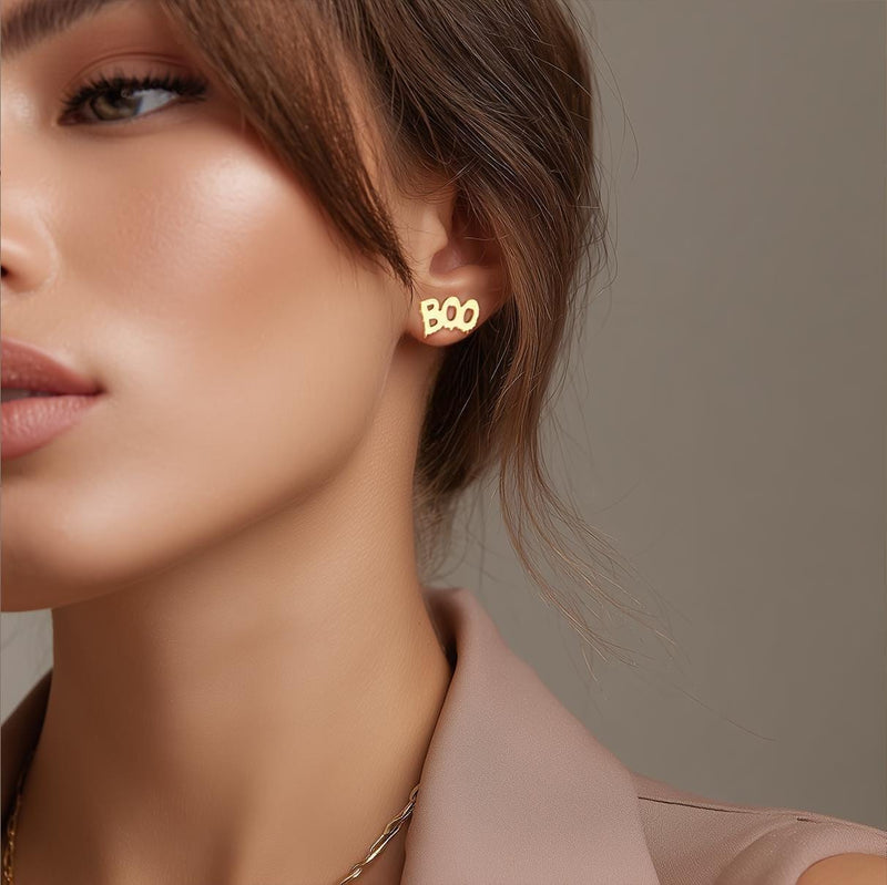 Pair of stud earrings spelling boo in rounded letters, in gold (4 of 8)