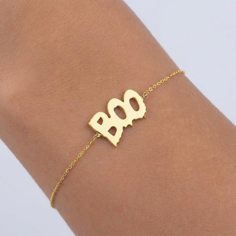 Fine gold chain bracelet with a small Halloween charm and lobster clasp (2 of 6)