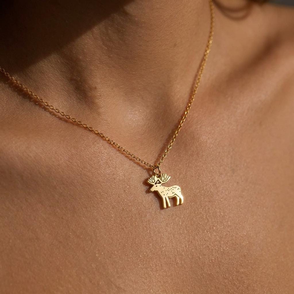 Dainty gold moose pendant with broad antlers on a fine chain (2 of 10)
