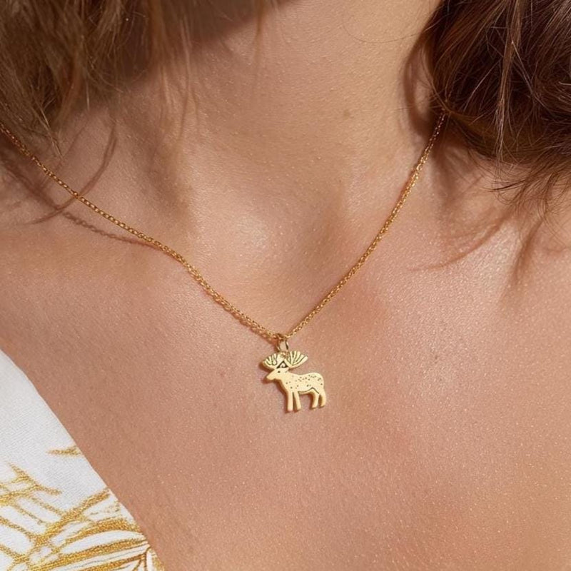 Dainty gold moose pendant with broad antlers on a fine chain (7 of 10)