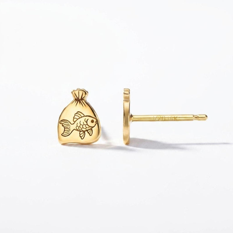 Pair of tiny goldfish stud earrings in gold shown side-on with a fanned tail