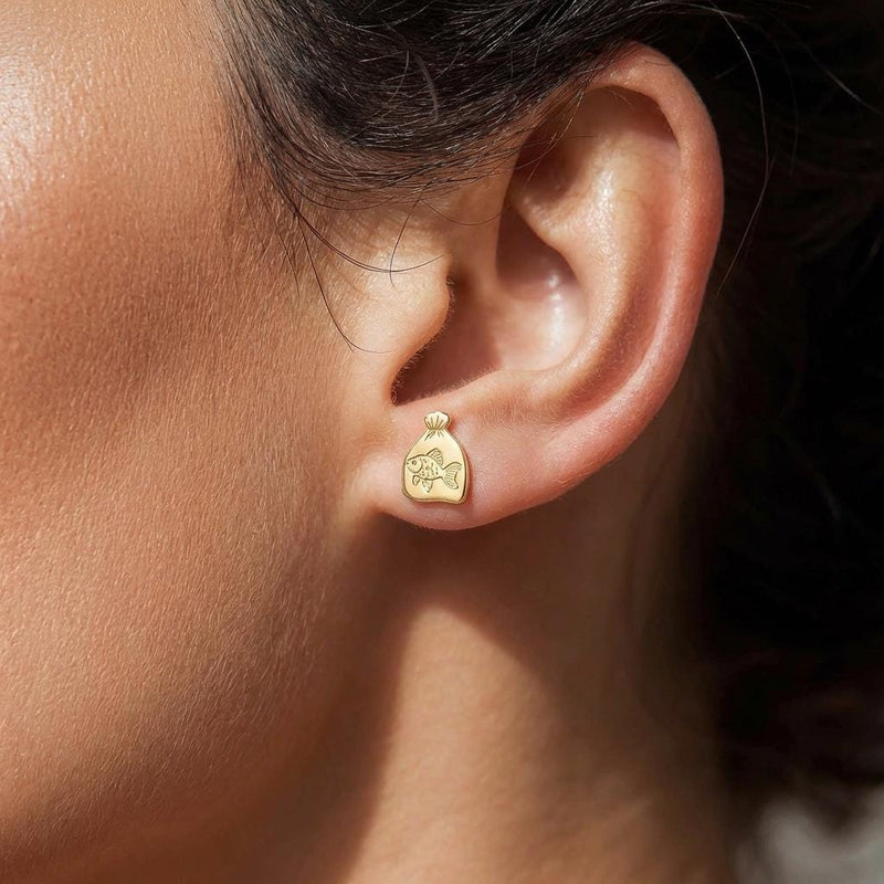 Pair of tiny goldfish stud earrings in gold shown side-on with a fanned tail (3 of 15)