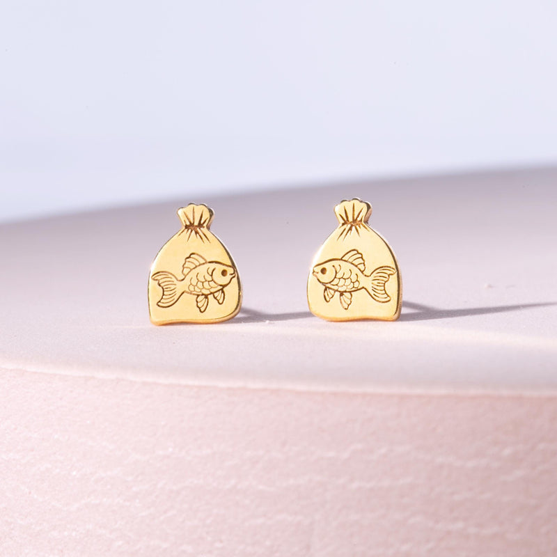 Pair of tiny goldfish stud earrings in gold shown side-on with a fanned tail (7 of 15)