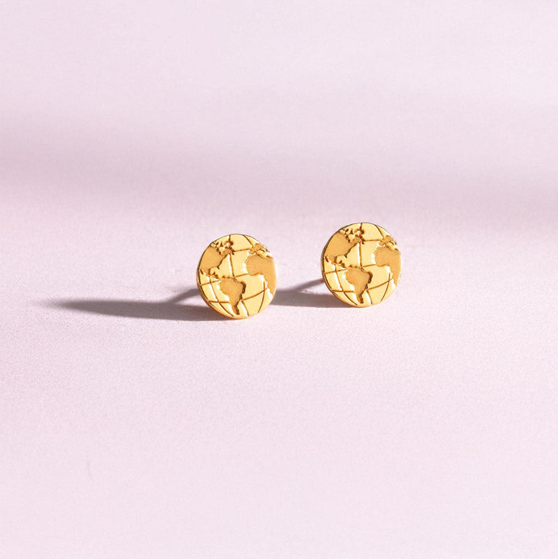 Pair of tiny round gold globe stud earrings with meridian lines, on white (3 of 12)