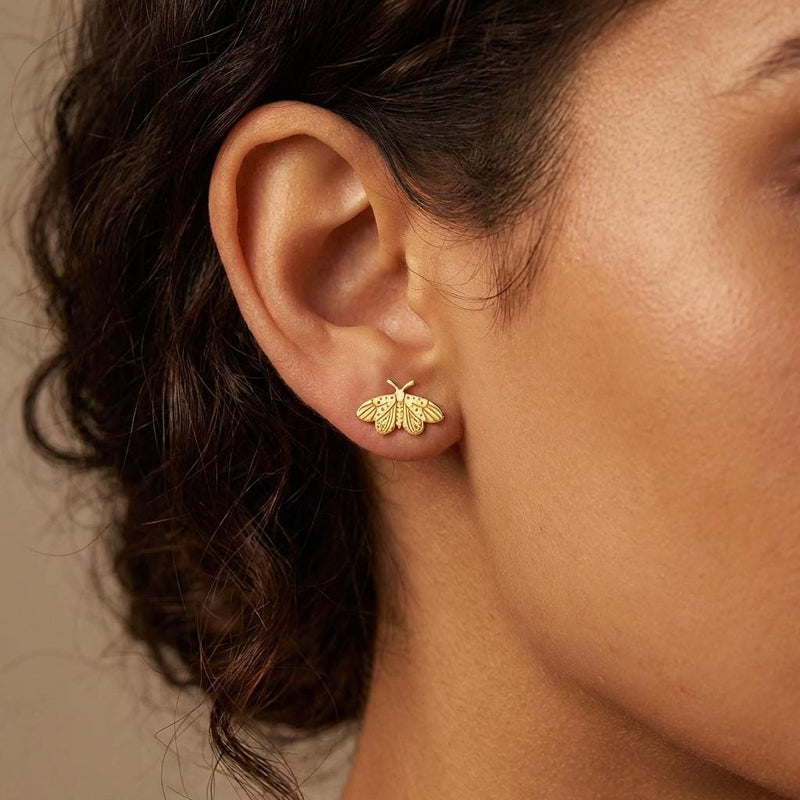 Small gold moth stud earrings with broad wings and feathered antennae (5 of 12)
