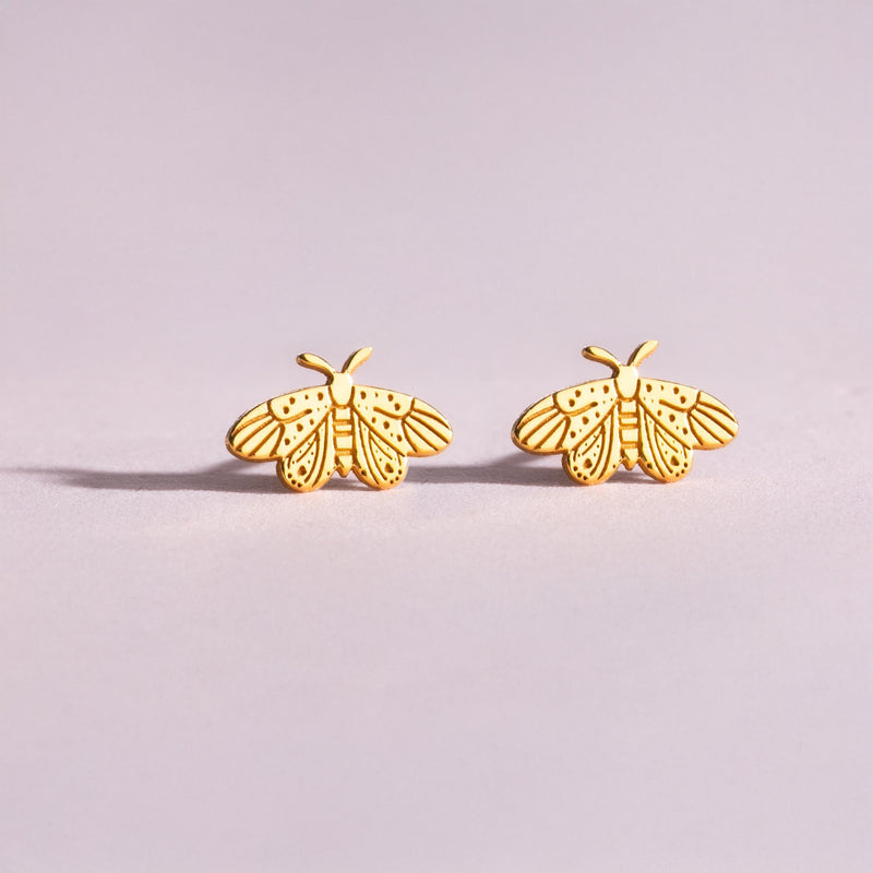 Small gold moth stud earrings with broad wings and feathered antennae (9 of 12)
