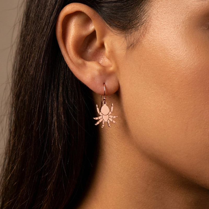 Pair of gold tarantula earrings hanging from short posts, legs spread. (6 of 8)