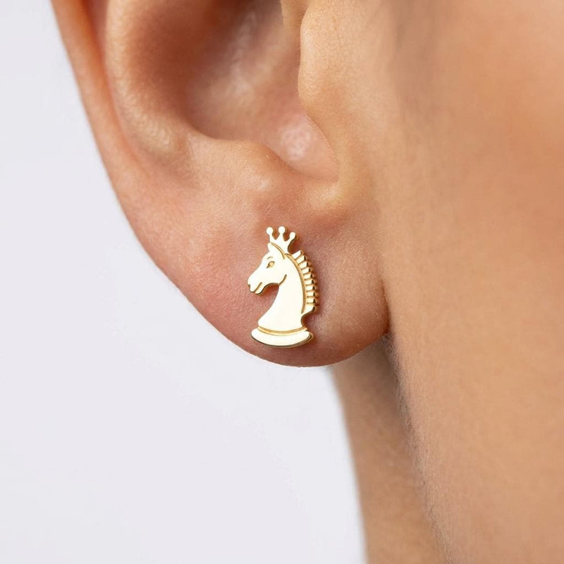 Pair of gold chess piece stud earrings shown in side profile (2 of 9)