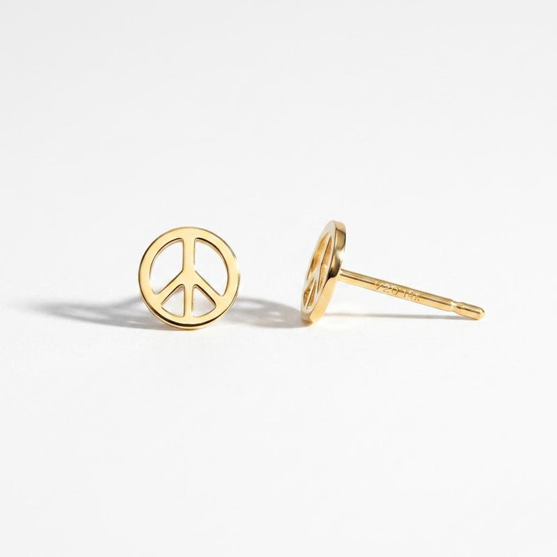 Pair of small round gold peace sign stud earrings