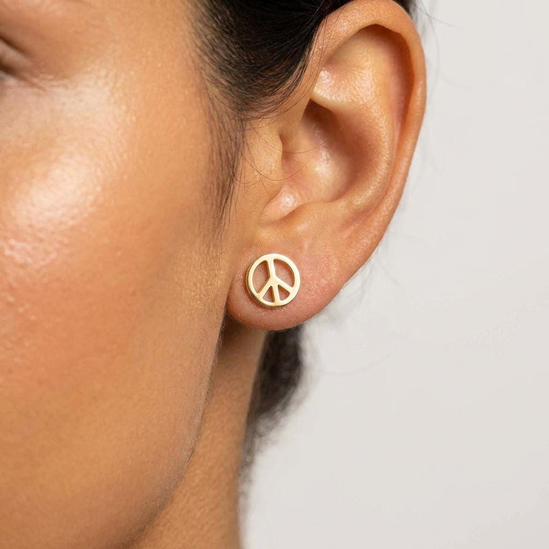 Pair of small round gold peace sign stud earrings (2 of 11)