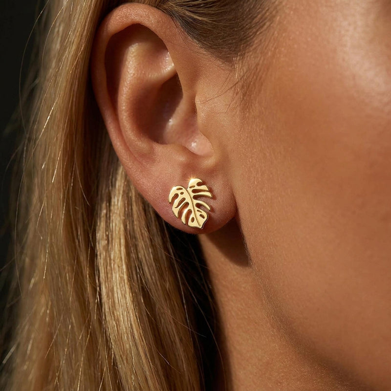 Tiny gold monstera leaf stud earrings with split leaf detail (2 of 10)