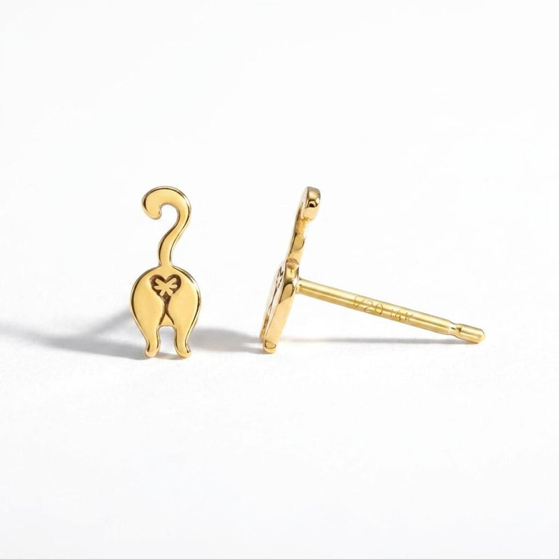 Pair of small gold cat rear view stud earrings with a tiny heart