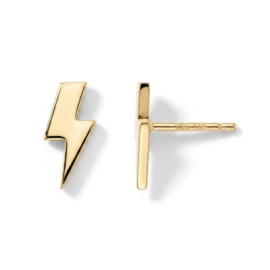 Pair of small gold lightning bolt stud earrings with sharp angled points.