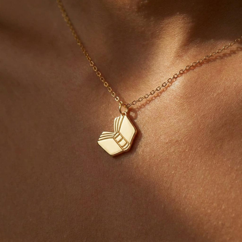 Dainty gold open book pendant with splayed pages on a fine chain (2 of 10)