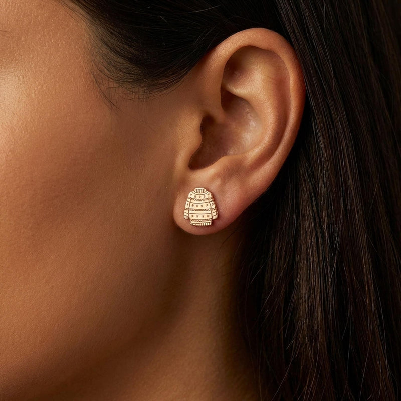 Pair of gold ugly Christmas sweater stud earrings with knit pattern