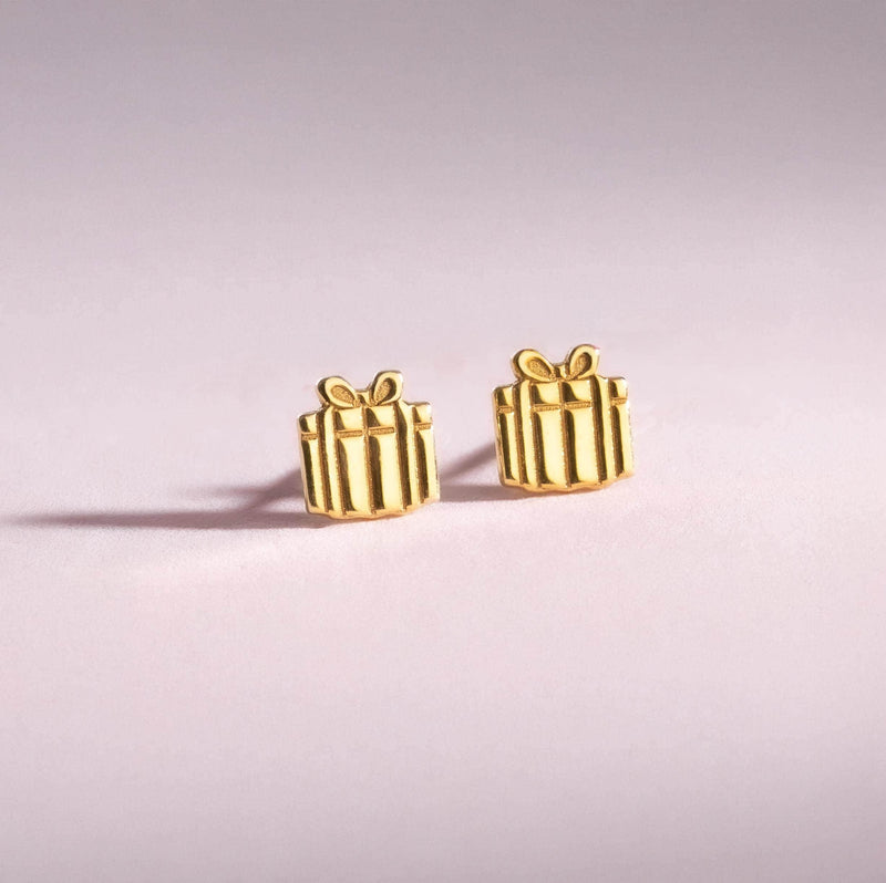 Pair of tiny gold present stud earrings with a ribbon across the front and a bow on top (3 of 11)