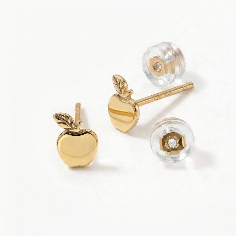 Pair of tiny gold apple stud earrings with stem and leaf, shown on white (5 of 10)