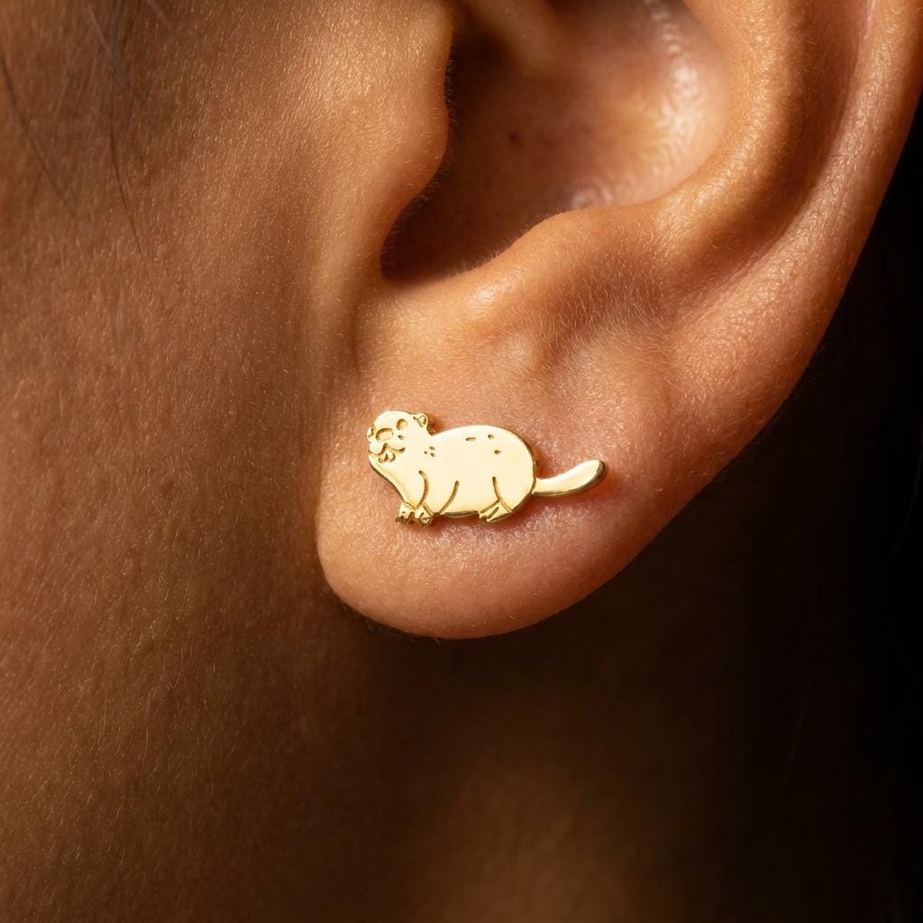 Pair of small beaver stud earrings with flat tails in gold (2 of 13)