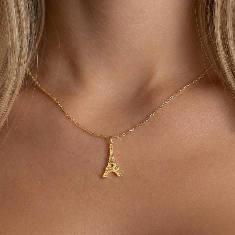 Narrow gold Eiffel Tower pendant with open lattice on a fine chain. (2 of 7)