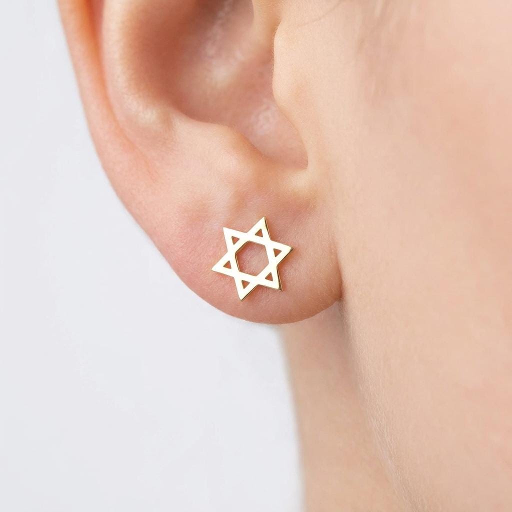 Pair of flat Star of David stud earrings in gold with even interlocking triangles