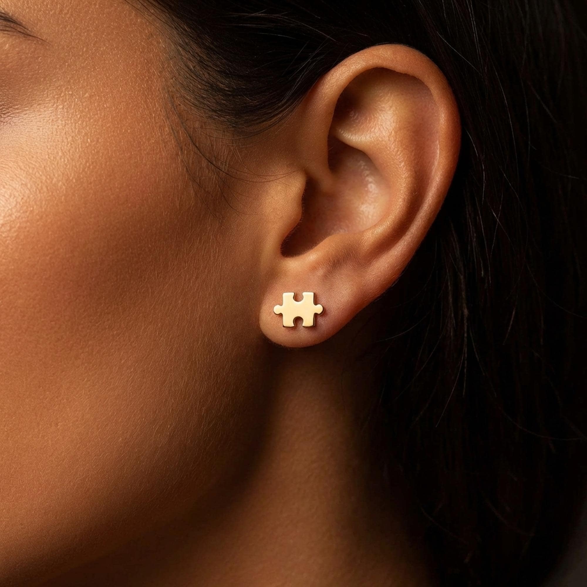 Pair of small gold puzzle piece stud earrings with a tab and notch (2 of 7)