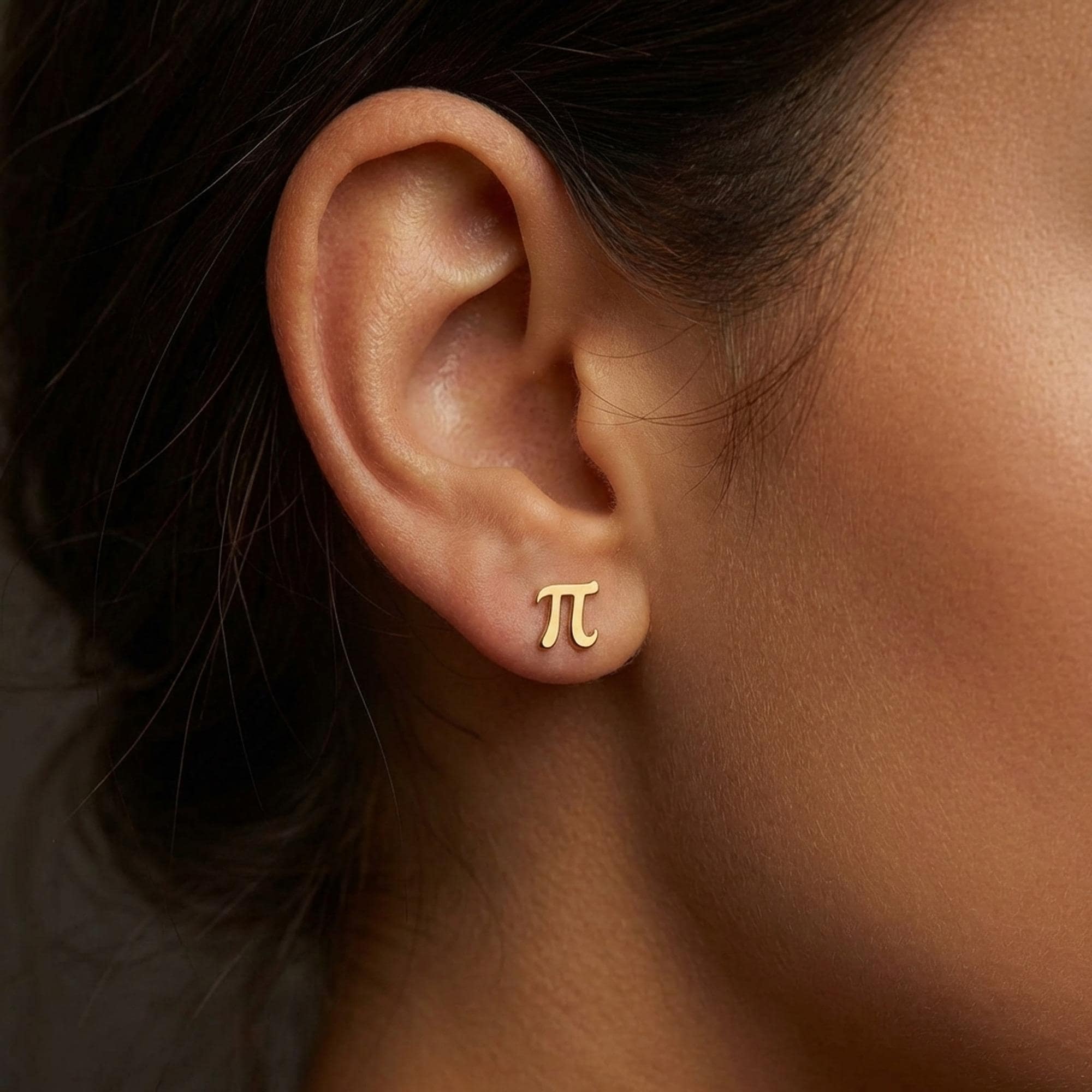 Pair of small pi symbol stud earrings in polished gold (2 of 11)