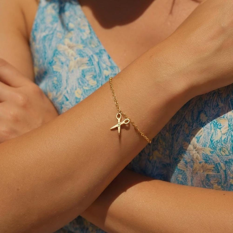 Tiny gold scissors charm on a fine chain bracelet with lobster clasp (5 of 8)