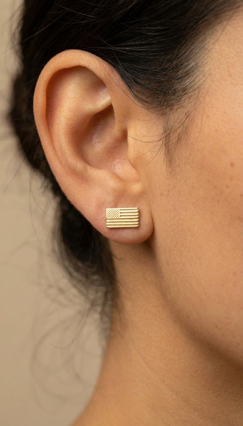 Pair of tiny gold American flag stud earrings with stars and stripes, on white (2 of 10)