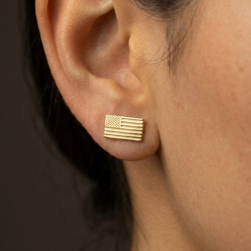 Pair of tiny gold American flag stud earrings with stars and stripes, on white (8 of 10)