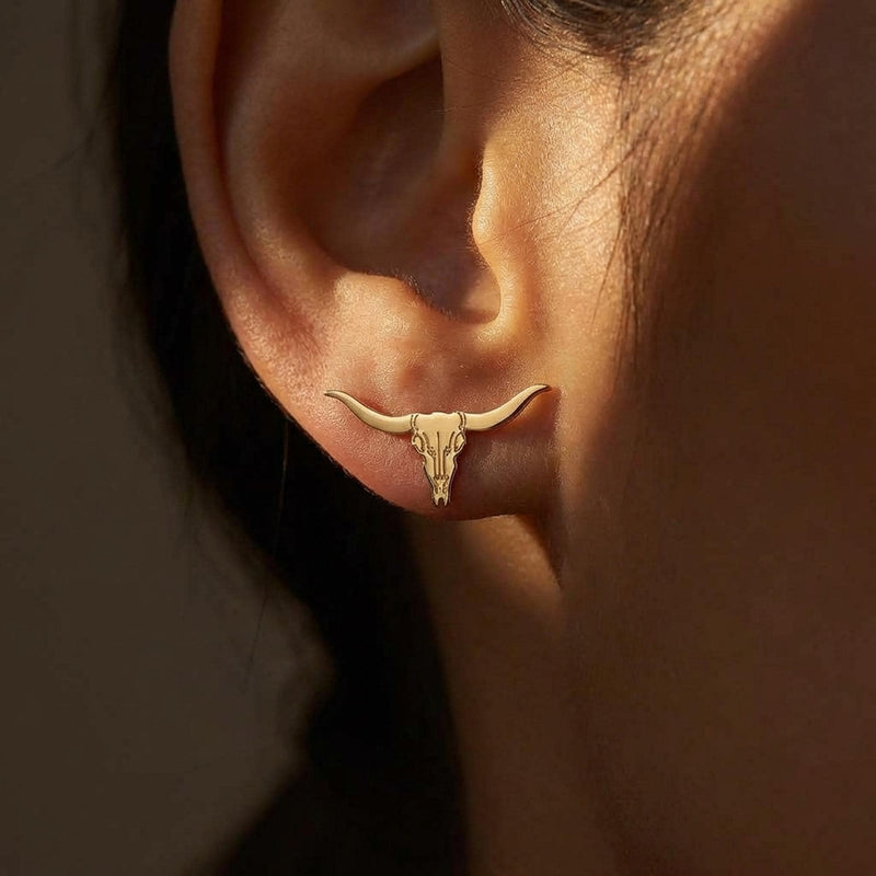 Pair of gold longhorn steer skull stud earrings with wide sweeping horns (3 of 10)