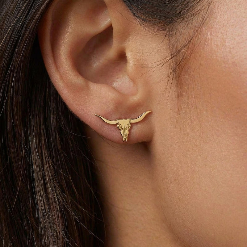 Pair of gold longhorn steer skull stud earrings with wide sweeping horns (7 of 10)