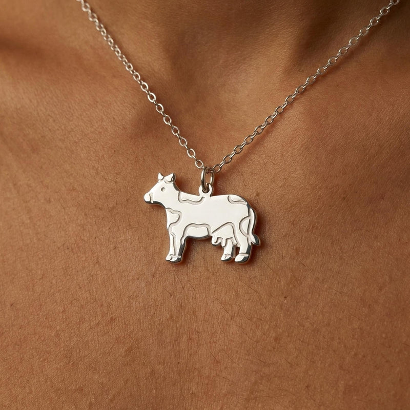 Small gold cow charm in profile on a fine cable chain necklace (3 of 10)
