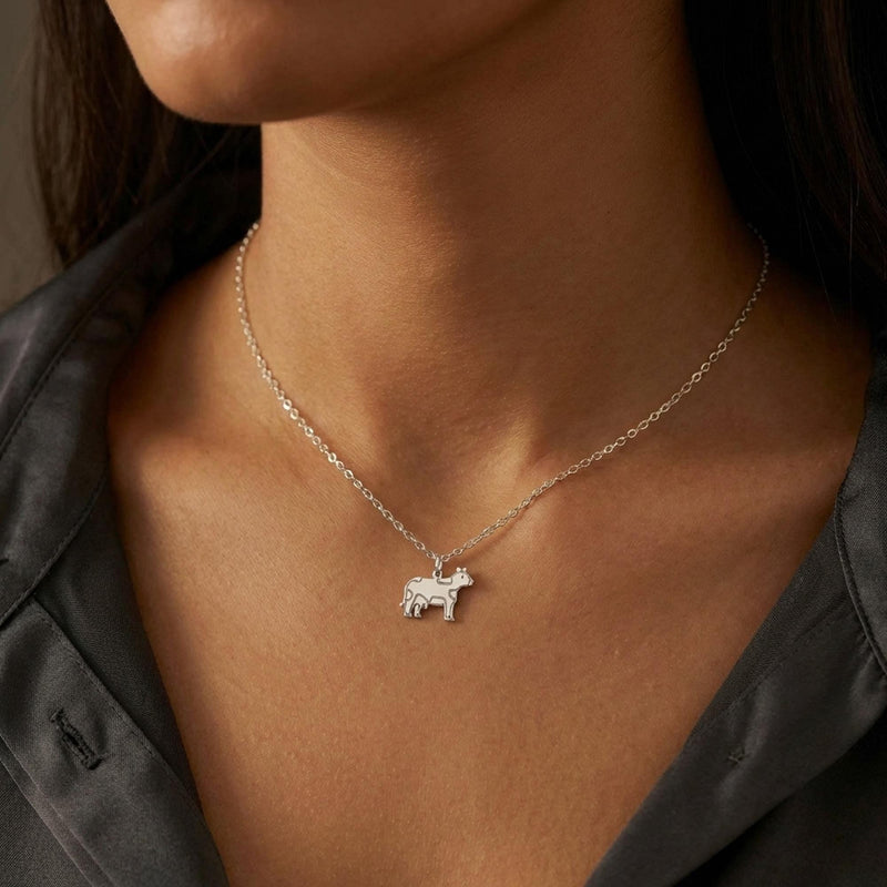 Small gold cow charm in profile on a fine cable chain necklace (4 of 10)