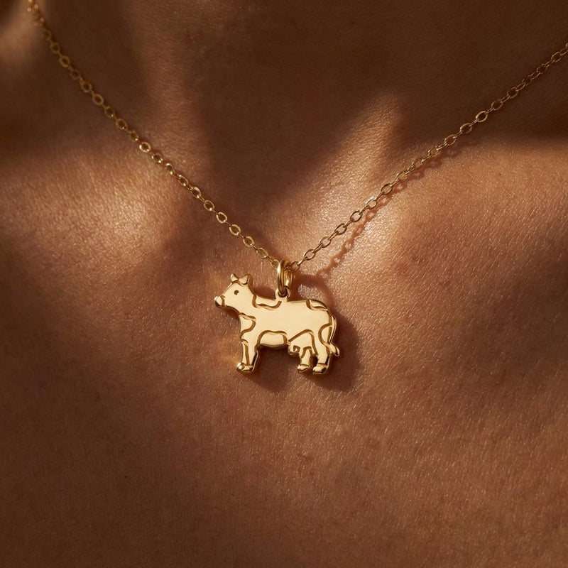 Small gold cow charm in profile on a fine cable chain necklace (5 of 10)