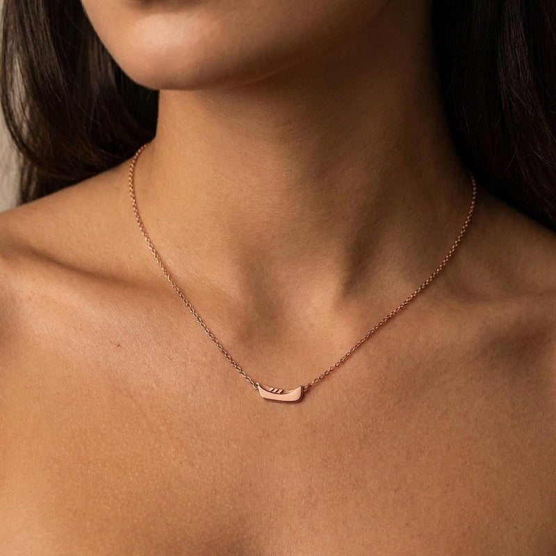 Dainty gold canoe pendant on a fine chain, shown from the side (9 of 12)