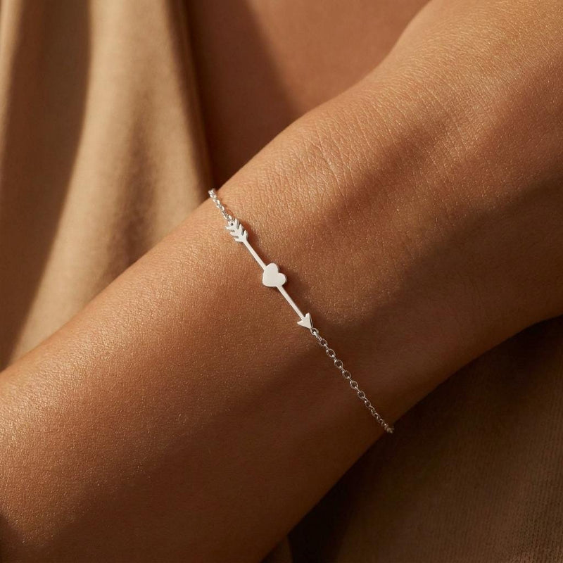 Fine gold chain bracelet with a flat heart and arrow charm (2 of 14)