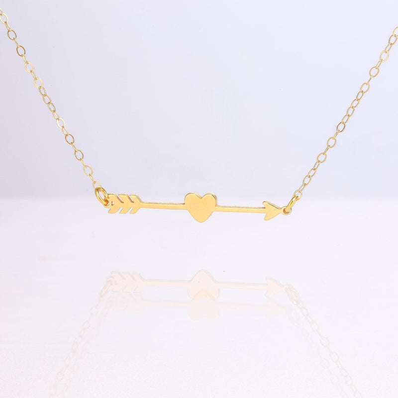 Fine gold chain bracelet with a flat heart and arrow charm (5 of 14)