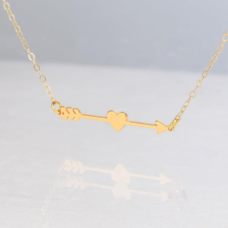 Fine gold chain bracelet with a flat heart and arrow charm (6 of 14)