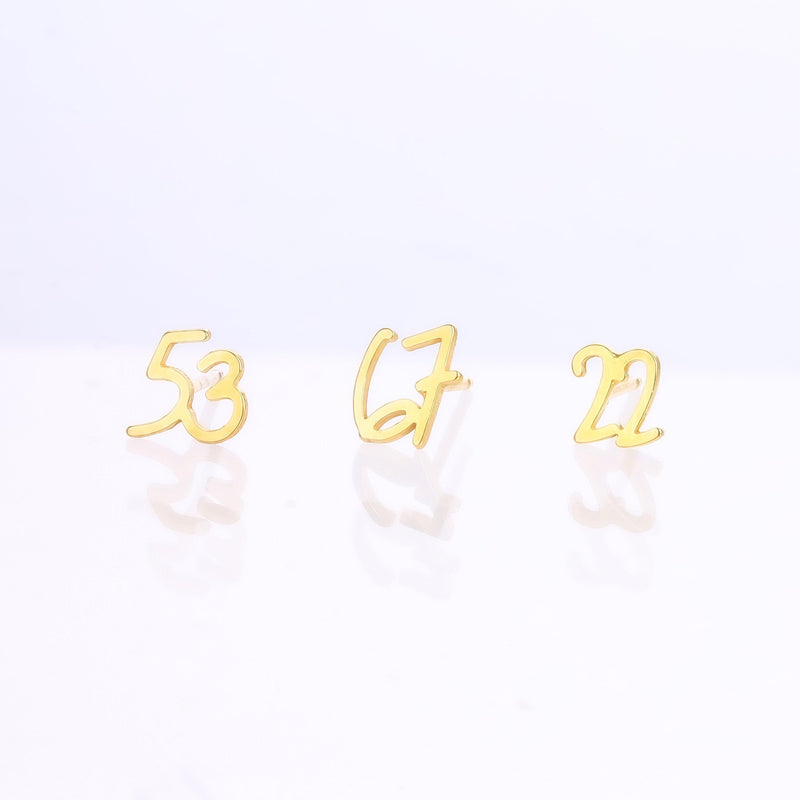 Gold varsity number pendant necklace on a fine cable chain