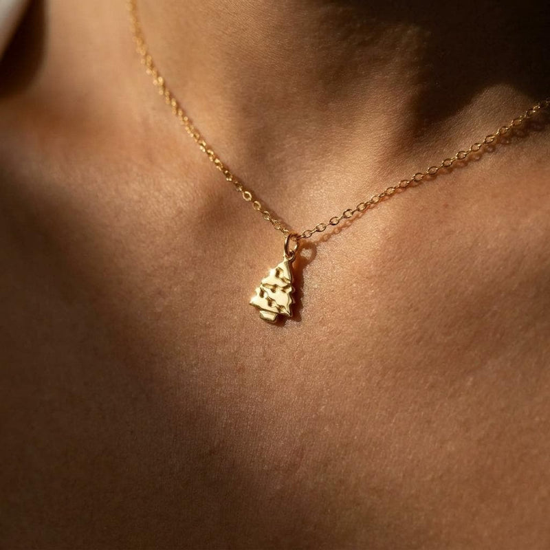 Fine gold chain necklace with a small tiered Christmas tree pendant (2 of 11)