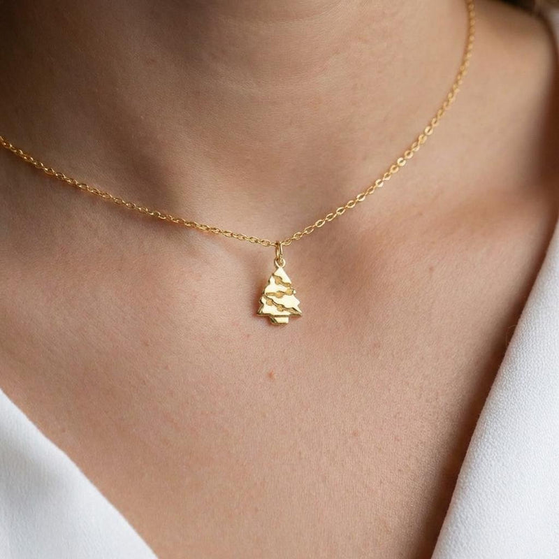Fine gold chain necklace with a small tiered Christmas tree pendant (5 of 11)